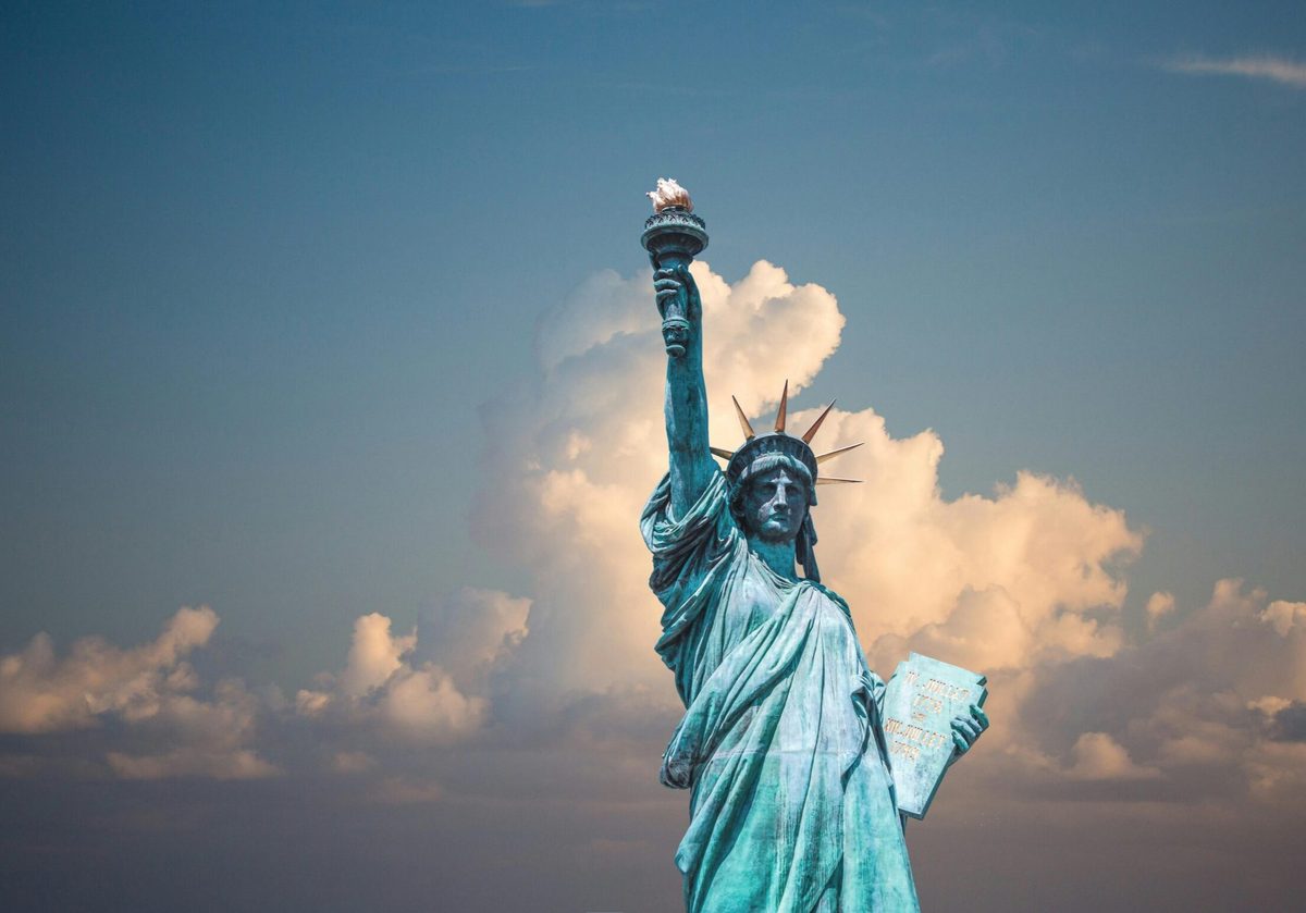 The Statue of Liberty against a bright sky